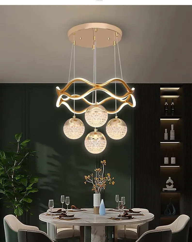 Luxury dining room chandelier with gold accents installed by Pankaj Electricals